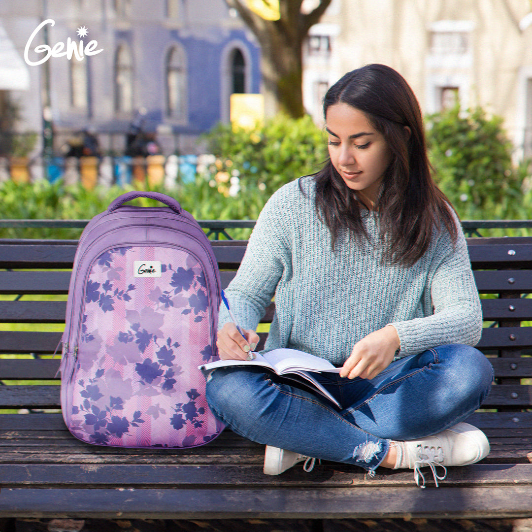 Woman sitting with purple floral backpack beside